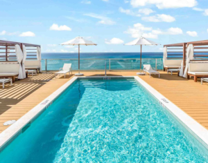 Grand Cayman pool and deck with an ocean view Grand Cayman pool and deck with an ocean view